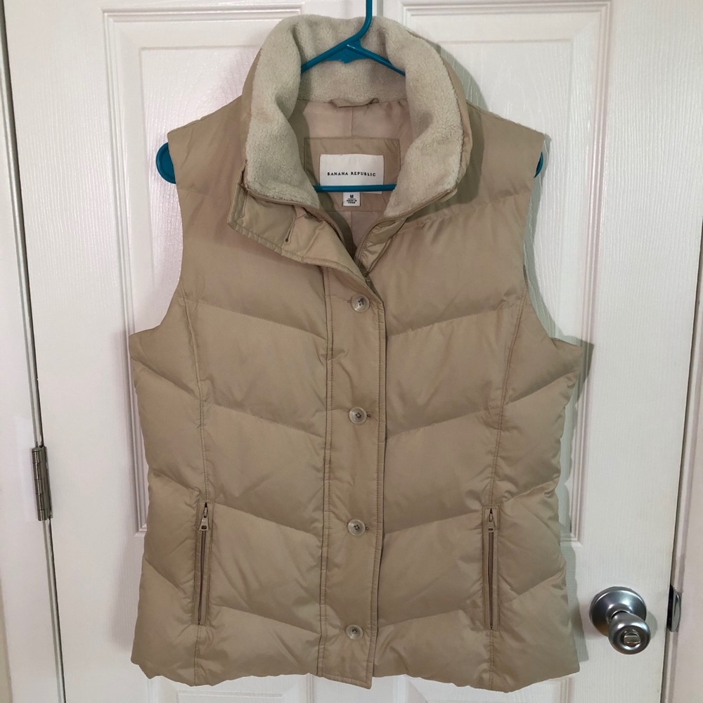 Cozy puffer vest with zip and button closure